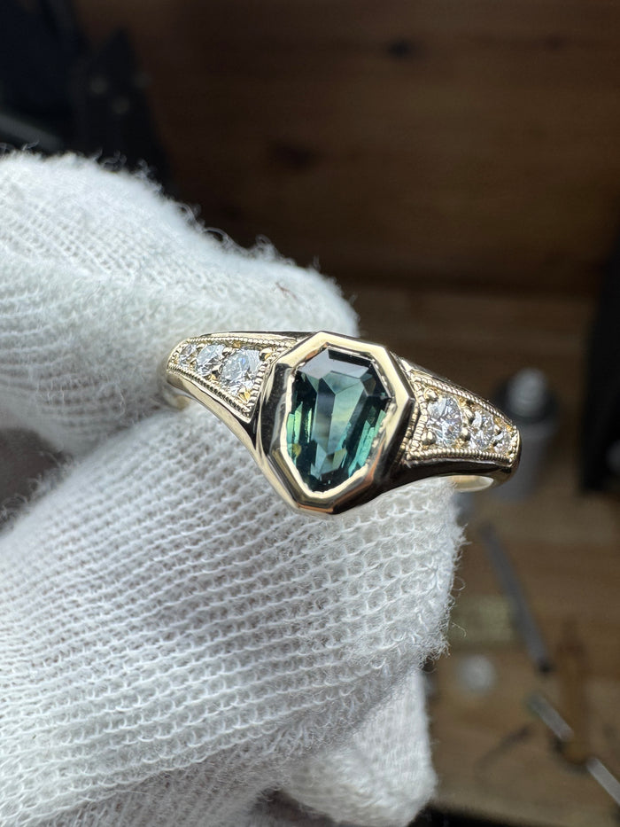 Teal sapphire & VS diamonds