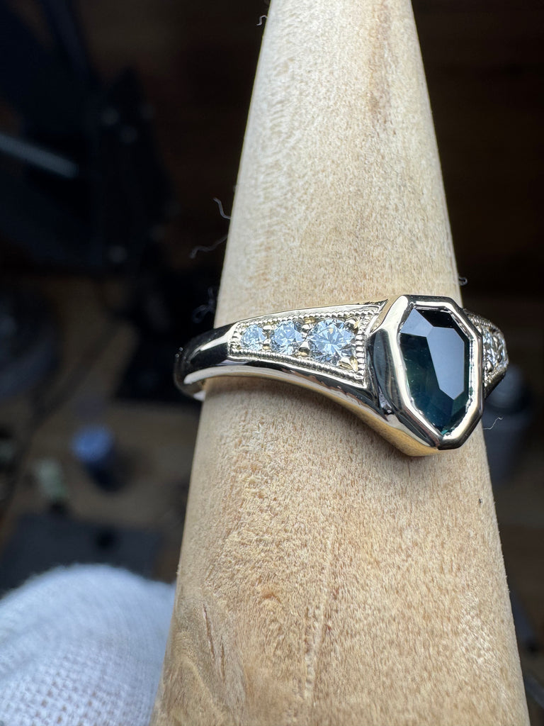 Teal sapphire & VS diamonds
