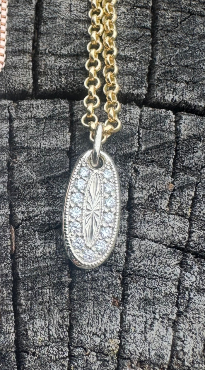 14k white gold VS diamonds tag