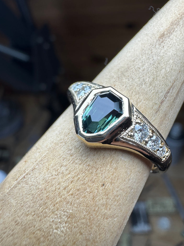 Teal sapphire & VS diamonds