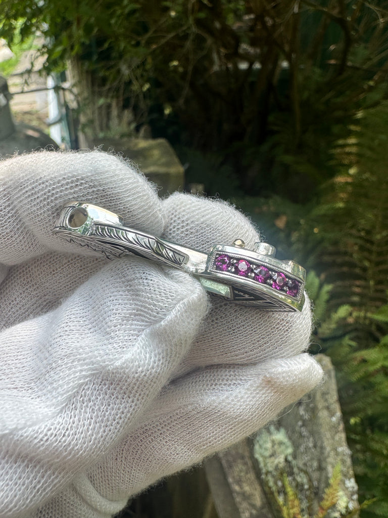 Blue tourmaline, garnet, and sapphire pendant