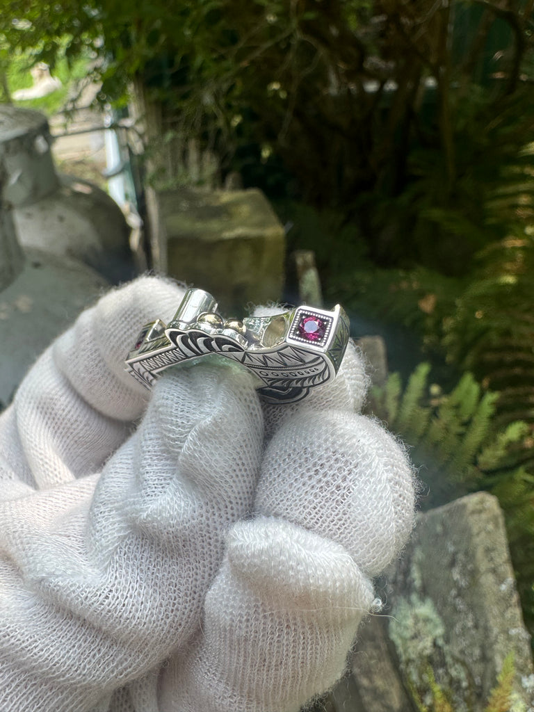 Blue tourmaline, garnet, and sapphire pendant