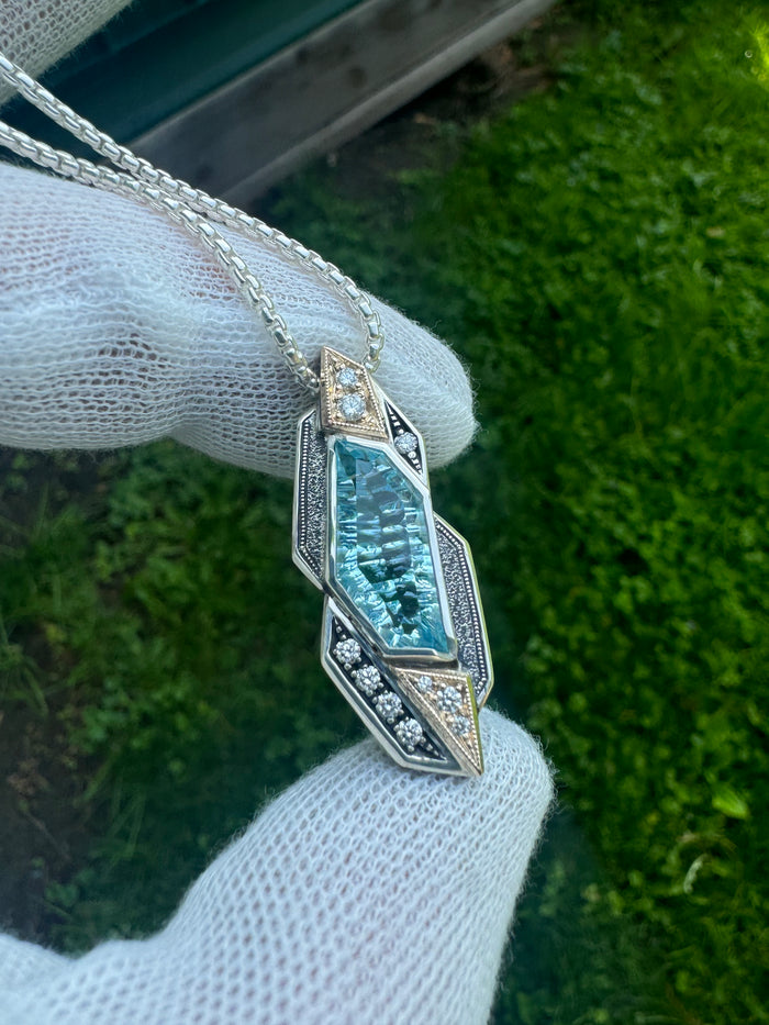 Aquamarine and diamond pendant