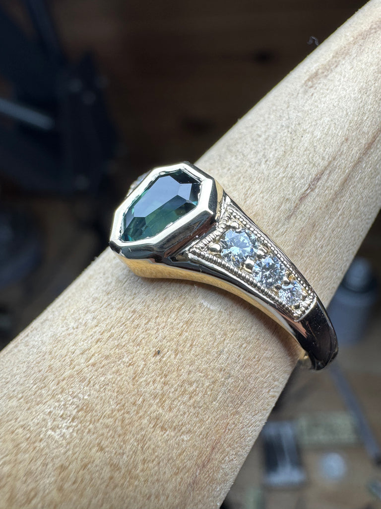 Teal sapphire & VS diamonds