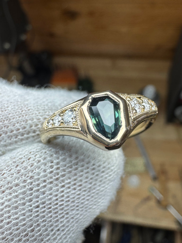 Teal sapphire & VS diamonds