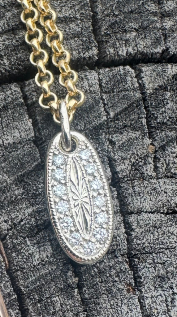 14k white gold VS diamonds tag