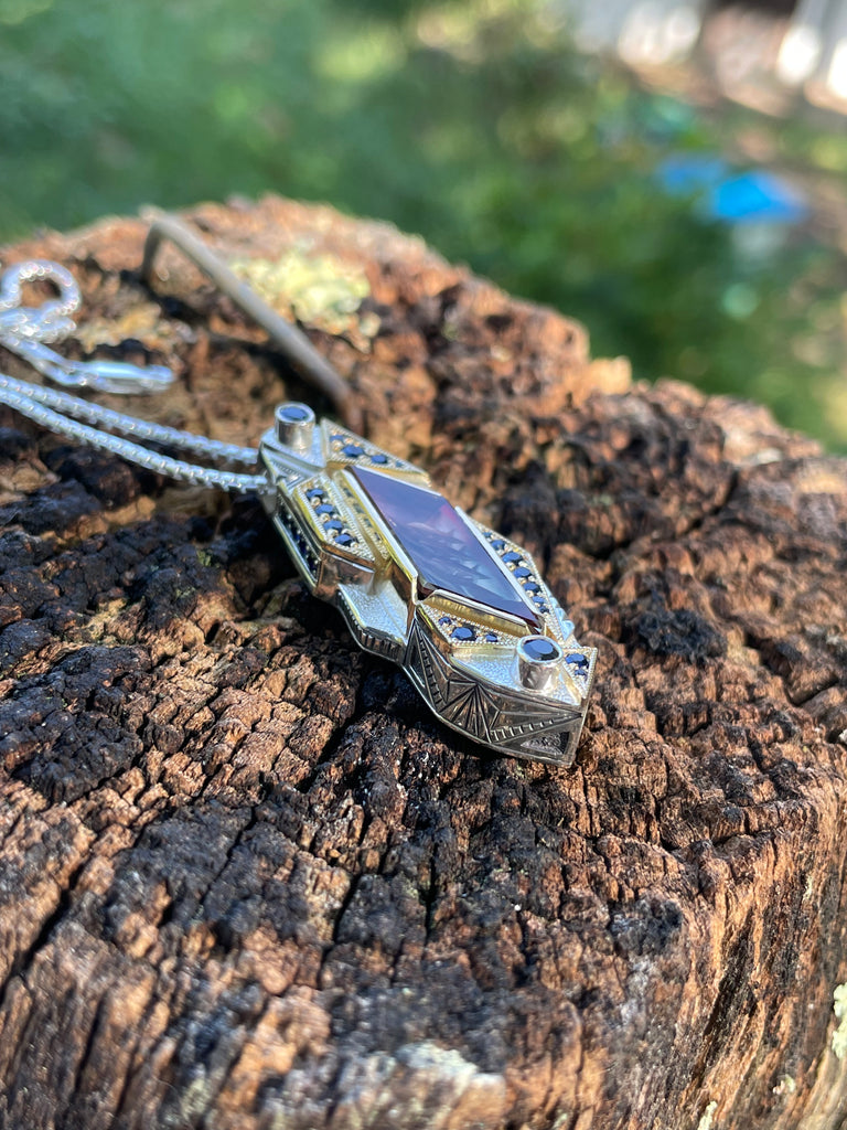 Soul Retrieval - Oregon sunstone and sapphire pendant