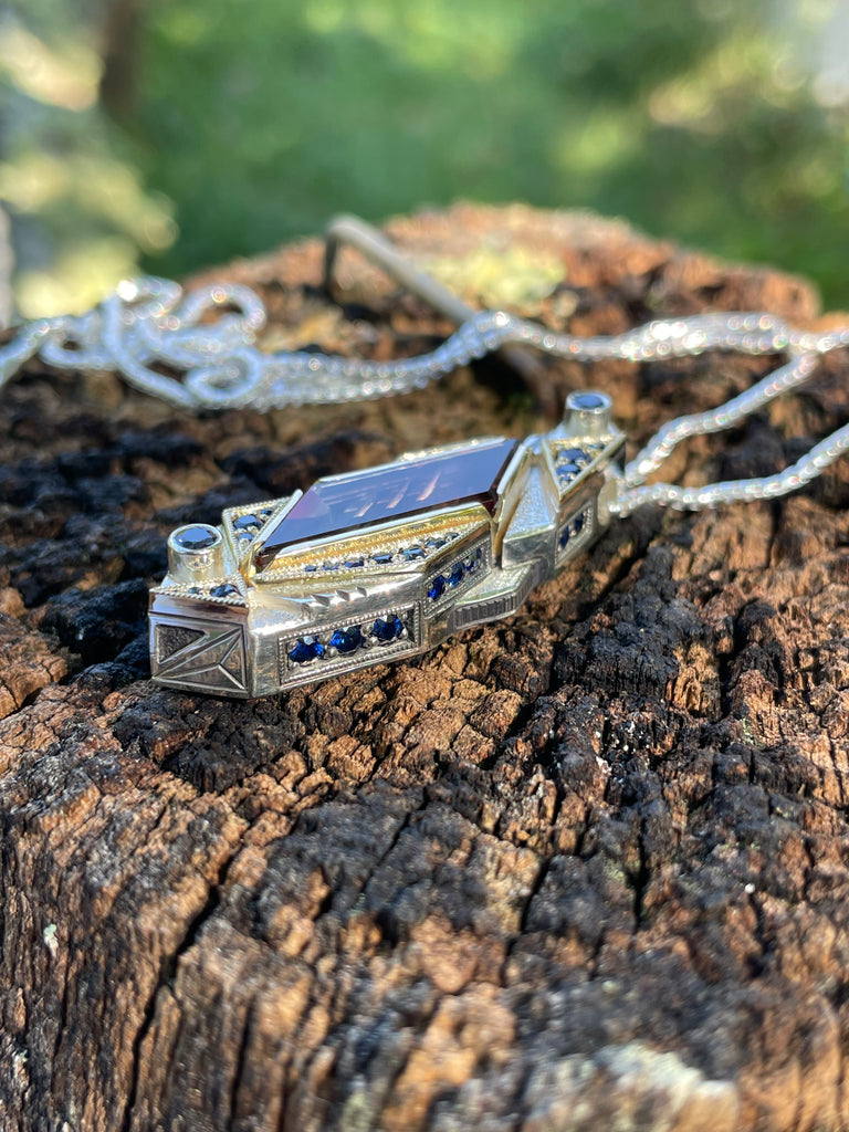 Soul Retrieval - Oregon sunstone and sapphire pendant