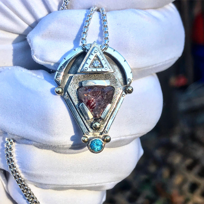 Hematite Included Quartz, topaz, and diamond pendant
