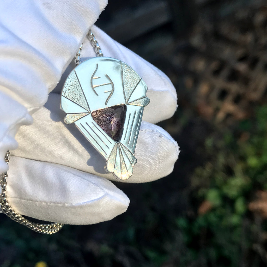 Hematite Included Quartz, topaz, and diamond pendant