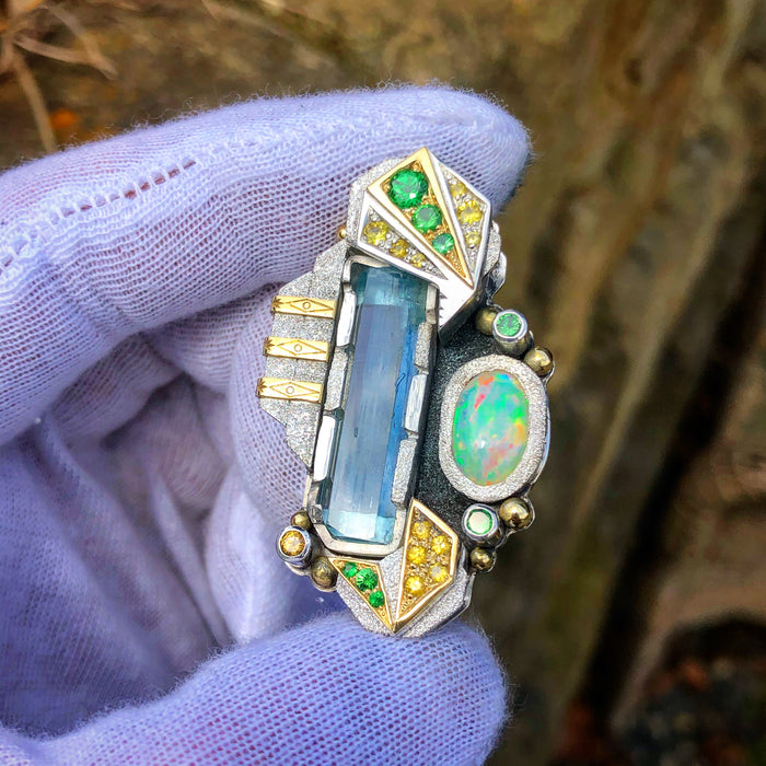 Aquamarine, opal, yellow sapphire and tsavorite garnet pendant