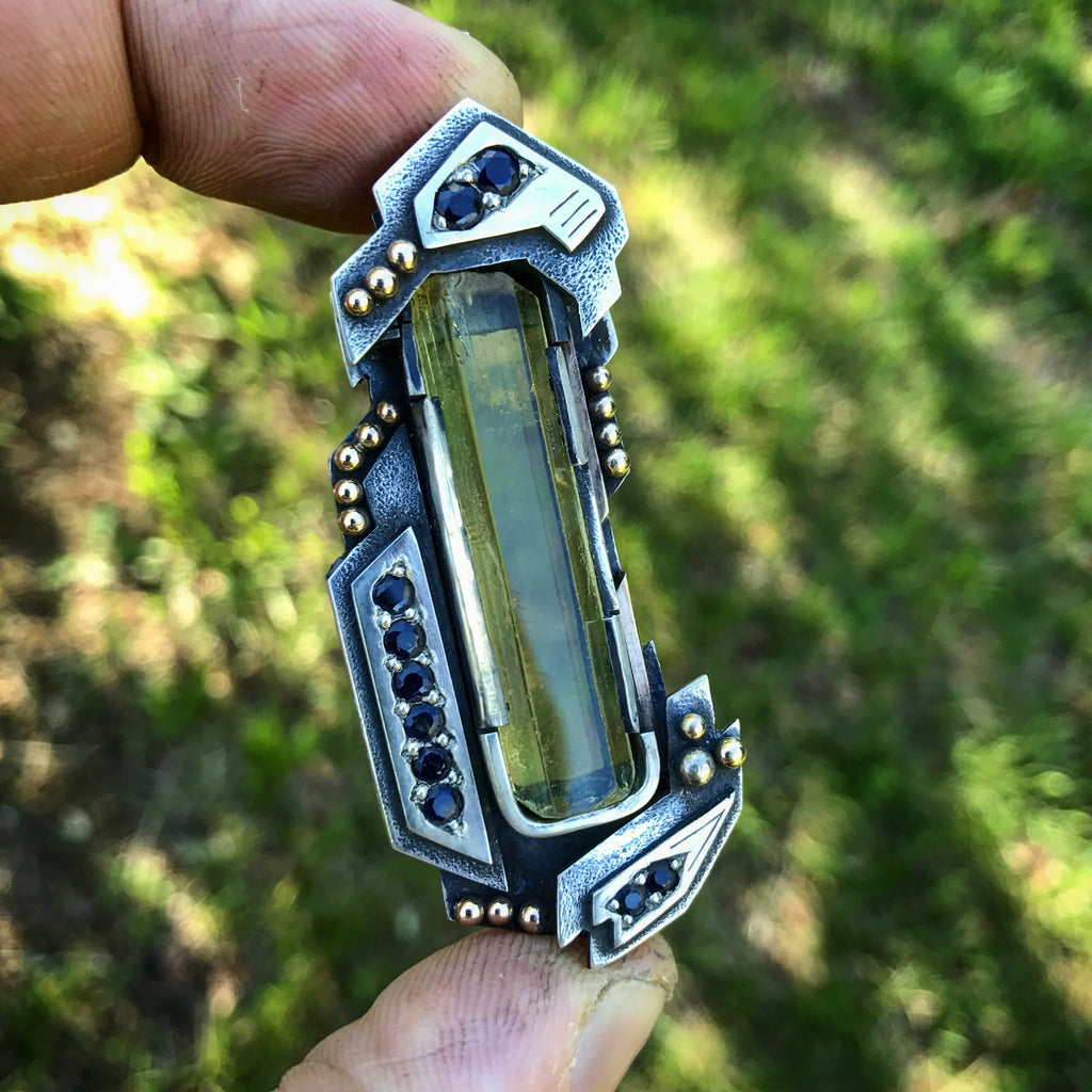 Heliodor and sapphire pendant