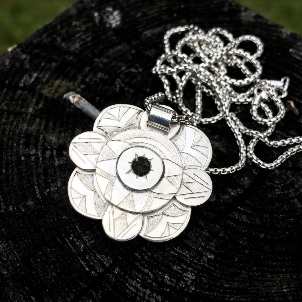 A Rose Quartz Mandala with Paraiba Tourmaline and amethyst