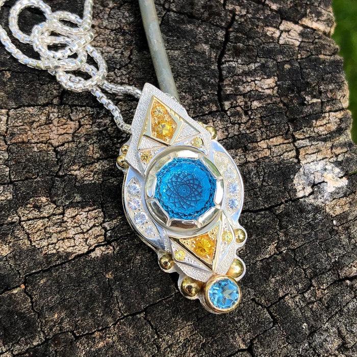 Topaz and sapphire pendant