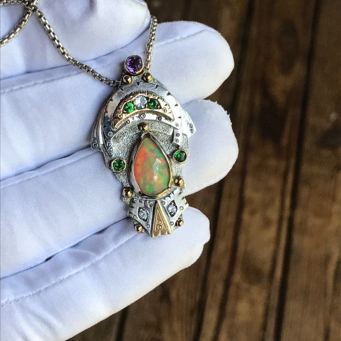 Ethiopian Opal, tsavorite garnet, phenakite, and amethyst pendant