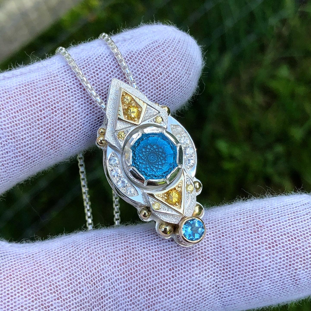 Topaz and sapphire pendant